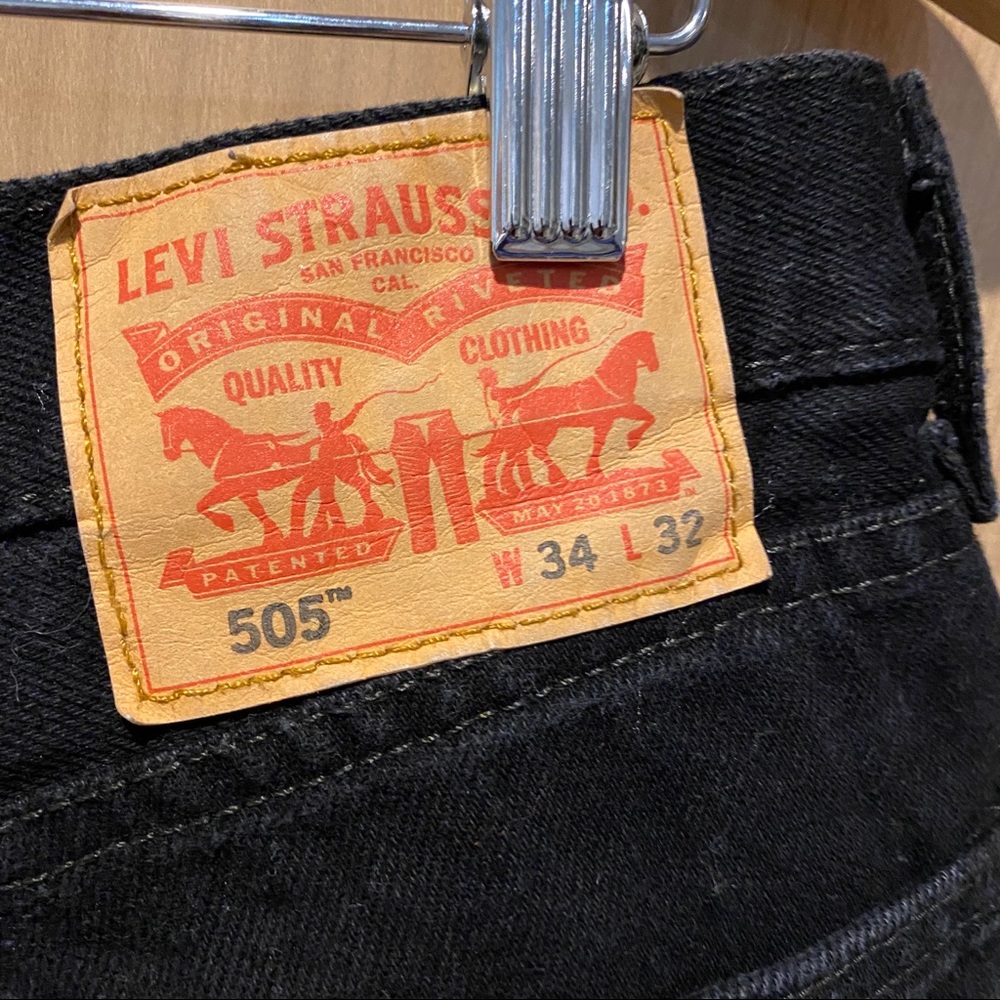 Levi’s distressed black denim cutoff shorts - Picture 3 of 3